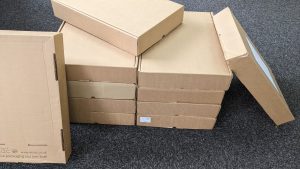 A stack of laptop boxes
